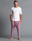 Male modeling Dusty Rose colored pants