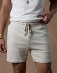 male modeling white stone resort shorts