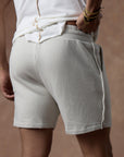 male modeling white stone resort shorts