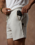 male modeling white stone resort shorts