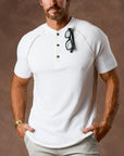 Man modeling a white Short Sleeve Henley