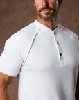 Man modeling a white Short Sleeve Henley