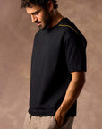male modeling black boxy tee