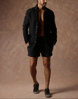 male modeling black resort shorts