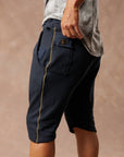 Man modeling milano mids in charcoal blue