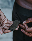 A man modeling the One Golden Thread Unders in Black