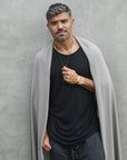 Male modeling grey fleece scarf