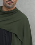 Man modeling green fleece scarf