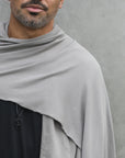 Male modeling grey fleece scarf