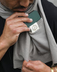 Male modeling grey fleece scarf
