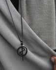 Male modeling grey fleece scarf