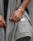 Male modeling grey fleece scarf