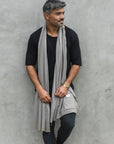 Male modeling grey fleece scarf