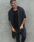 Man modeling slate fleece scarf