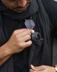 Man modeling slate fleece scarf