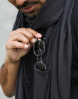 Man modeling slate fleece scarf