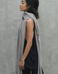 Women modeling grey fleece scarf