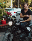 Male modeling black v neck shirt