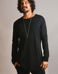 Man modeling a long sleeve crew shirt in black