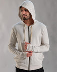 man modeling white stone hoodie