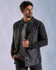 Male modeling dark mineral shacket