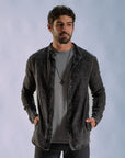 Male modeling dark mineral shacket