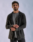 Male modeling dark mineral shacket