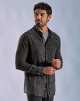 Male modeling dark mineral shacket