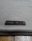 The One Golden Thread OG Cloud Beanie in Shroom with the saying "You are golden"