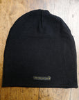 The One Golden Thread OG Cloud Beanie in Black with the saying "You are golden"