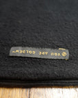 The One Golden Thread OG Cloud Beanie in Black with the saying "You are golden"