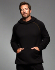 man modeling pullover plush hoodie in black