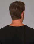 Man modeling a long sleeve crew shirt in black