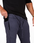 Male modeling Charcoal Blue yogo mid shorts