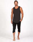 Male modeling black yogo mid shorts
