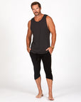Male modeling black yogo mid shorts