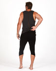 Male modeling black yogo mid shorts