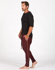 Male modeling Bordeaux colored pants