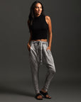 Woman modeling dance pants in Grey Mineral Wash