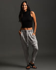 Woman modeling dance pants in Grey Mineral Wash