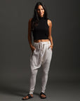 Woman modeling dance pants in White Stone