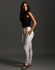 Woman modeling dance pants in White Stone