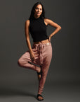 Woman modeling dance pants in Himalayan Salt