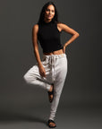 Woman modeling dance pants in White Stone
