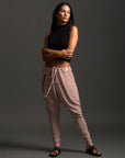Woman modeling dance pants in Himalayan Salt