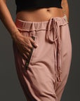 Woman modeling dance pants in Himalayan Salt