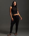 Woman modeling dance pants in Black