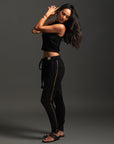 Woman modeling dance pants in Black