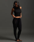 Woman modeling dance pants in Black