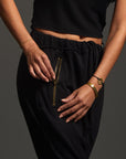 Woman modeling dance pants in Black